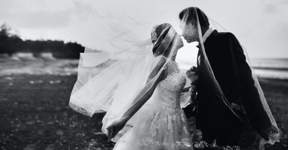 Bride and groom kissing on their wedding day