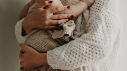 Mother holding her baby