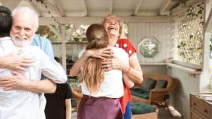 Mother in law and daughter in law are hugging